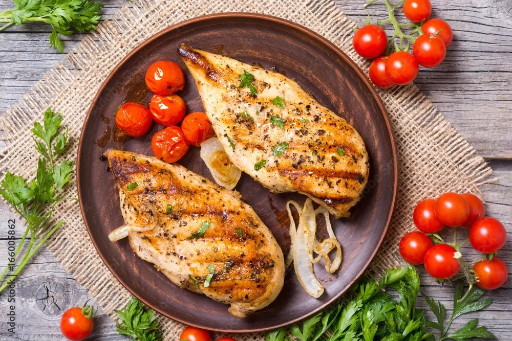 Coocked chicken breast in a plate