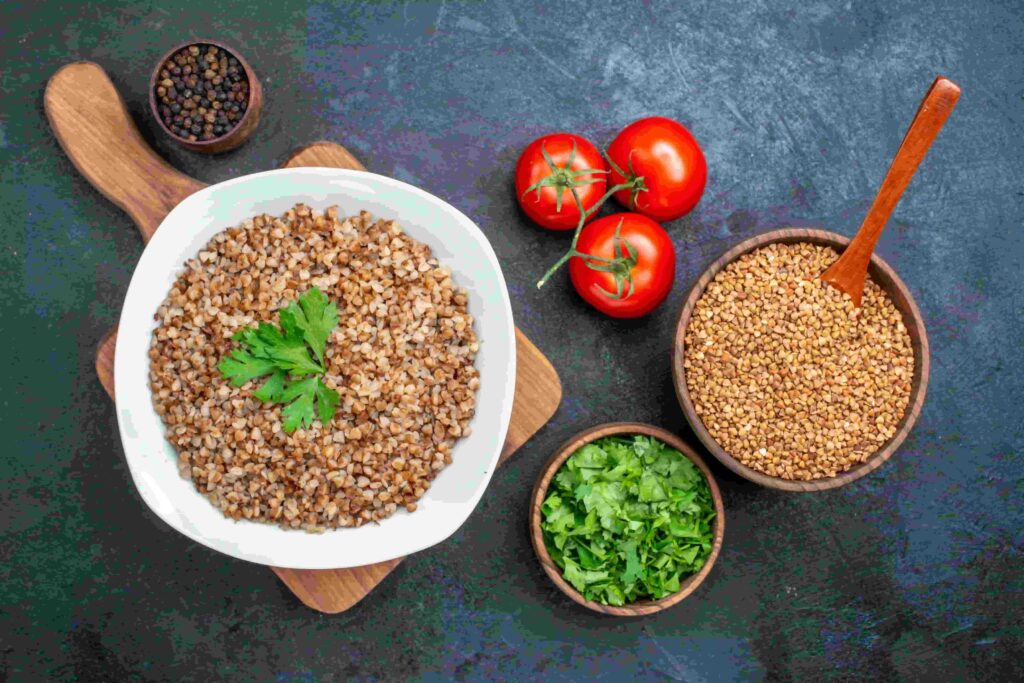 Quinoa with tomato and coriander in plates 