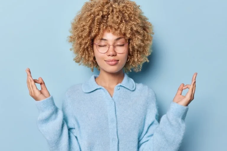 A lady trying to calm her mind.